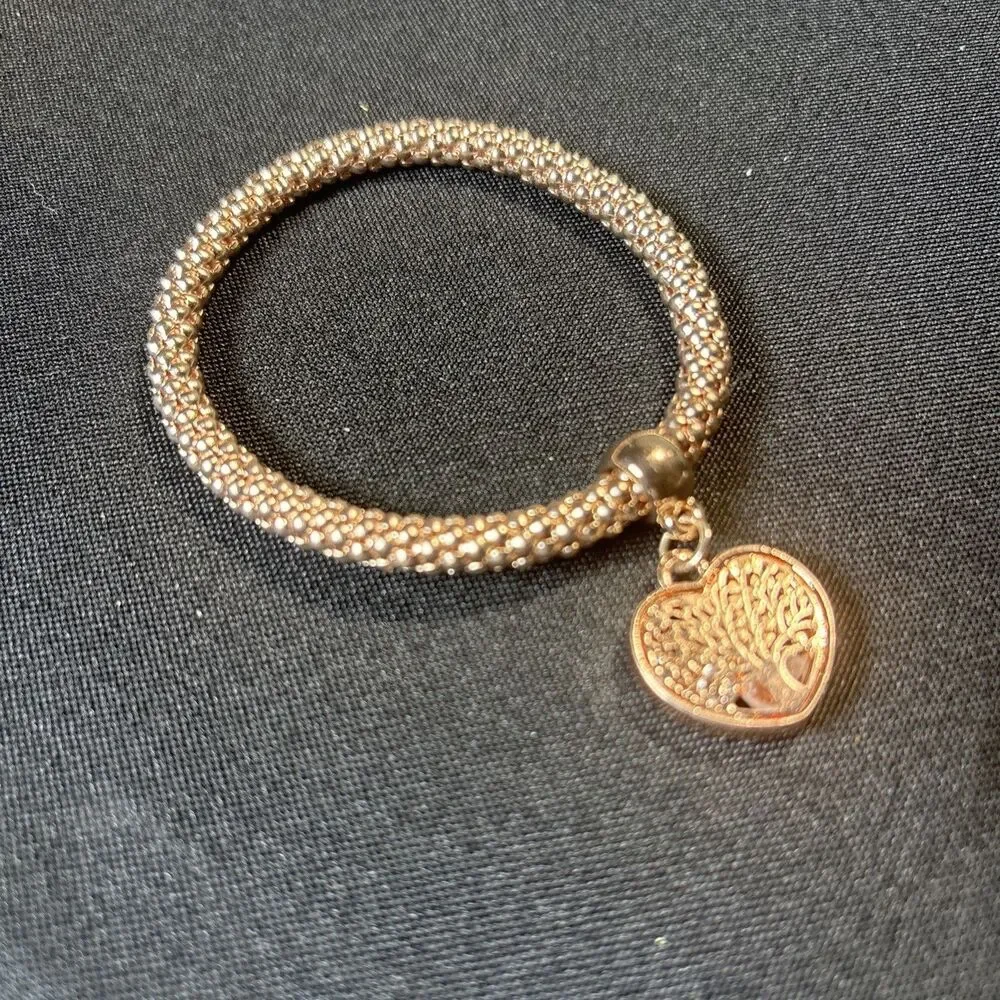 Rose gold bracelet stretch with heart pendant